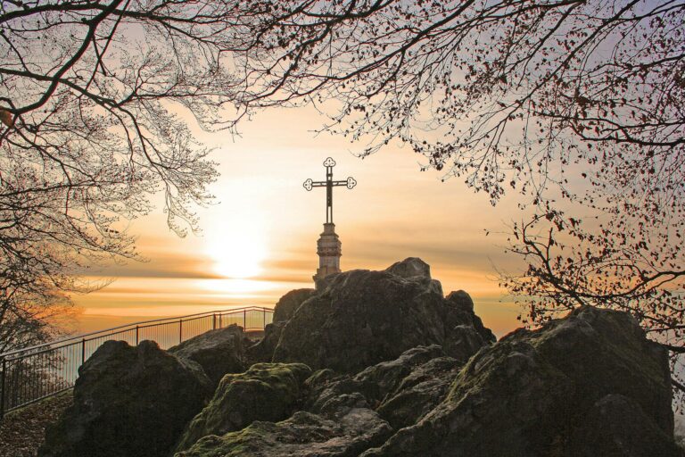 cross on top of rock